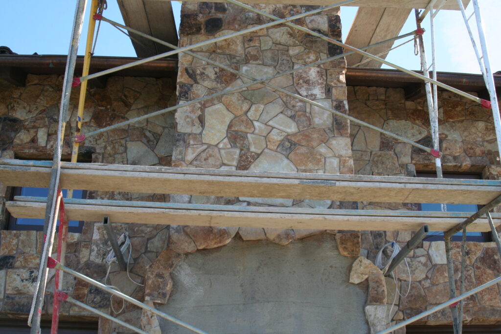 cut stone veneer of the exterior of a chimney
